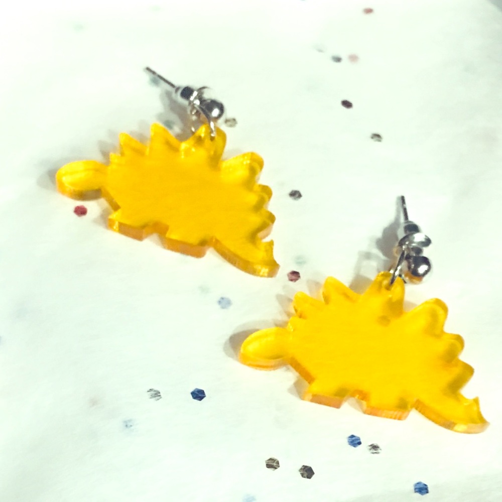 Yellow stegosaurus earrings! 💛🙂